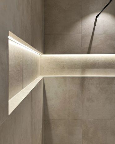 Diagonally lit hidden LED stone wall niche